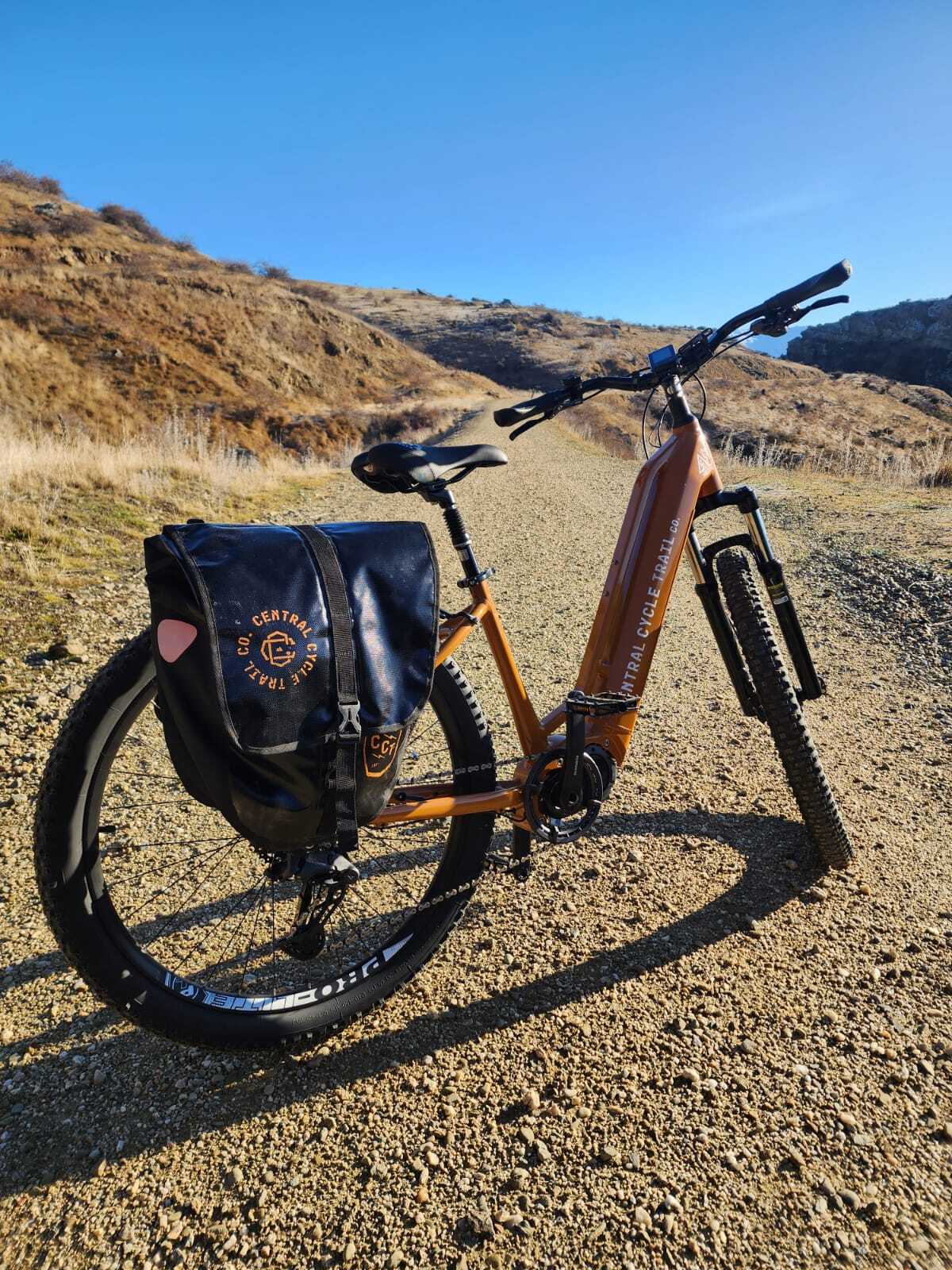 Auripo Orange bike on rail trail-image