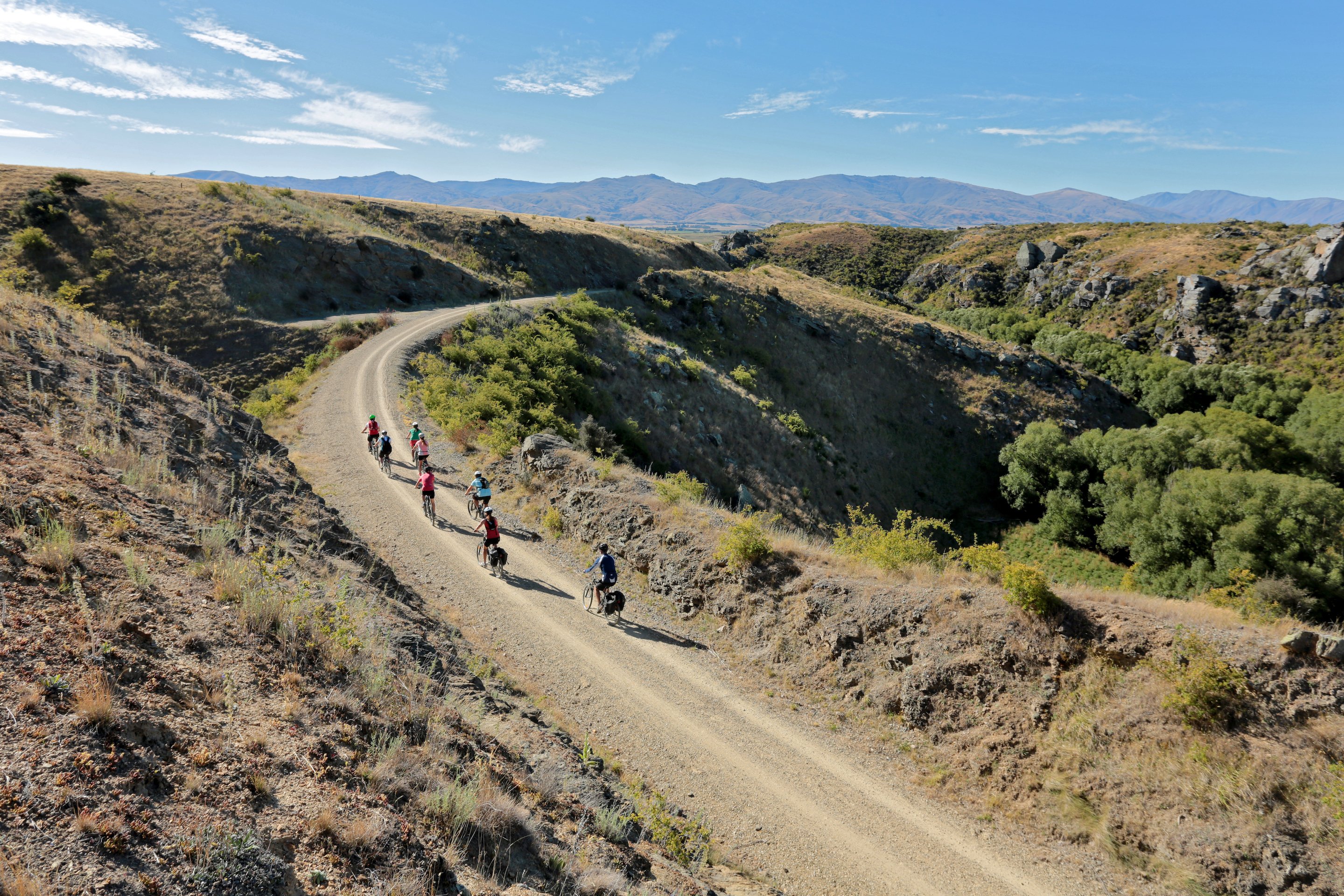 Summer-group-cycling-in-poolburn-gorge2-image